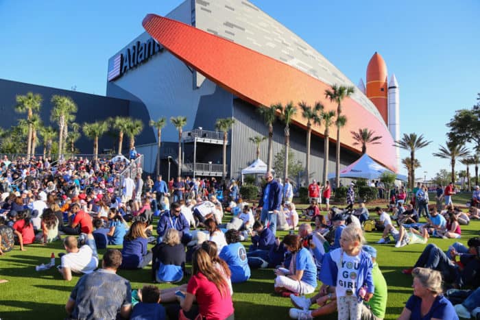 Launch Viewers at Kennedy Space Center Visitor Complex Stand on Soy-biobased Sustainability